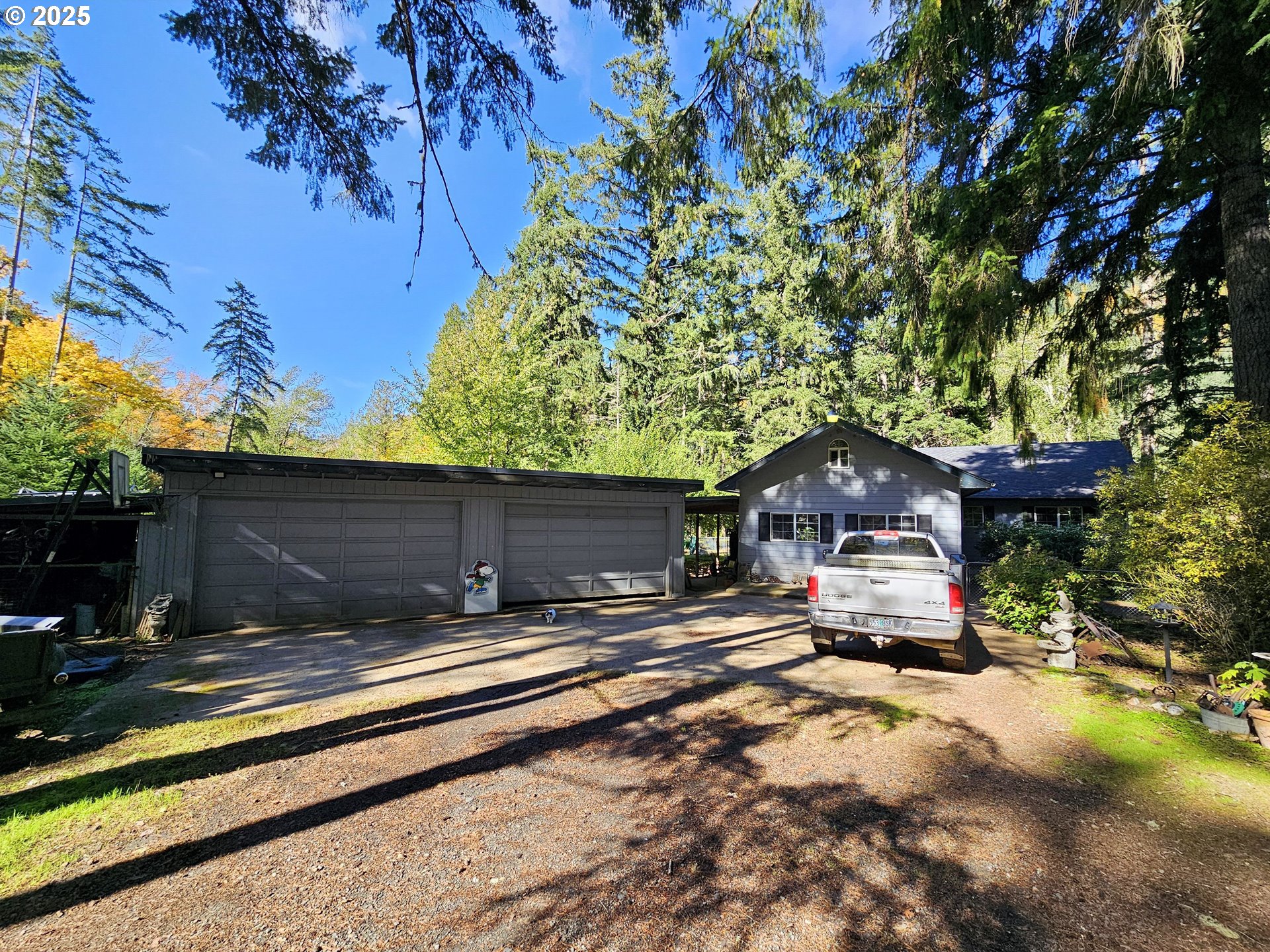 3463 Briarwood Road Umpqua, OR 97486 - Photo 23 of 29 a view of street with house and trees in the background