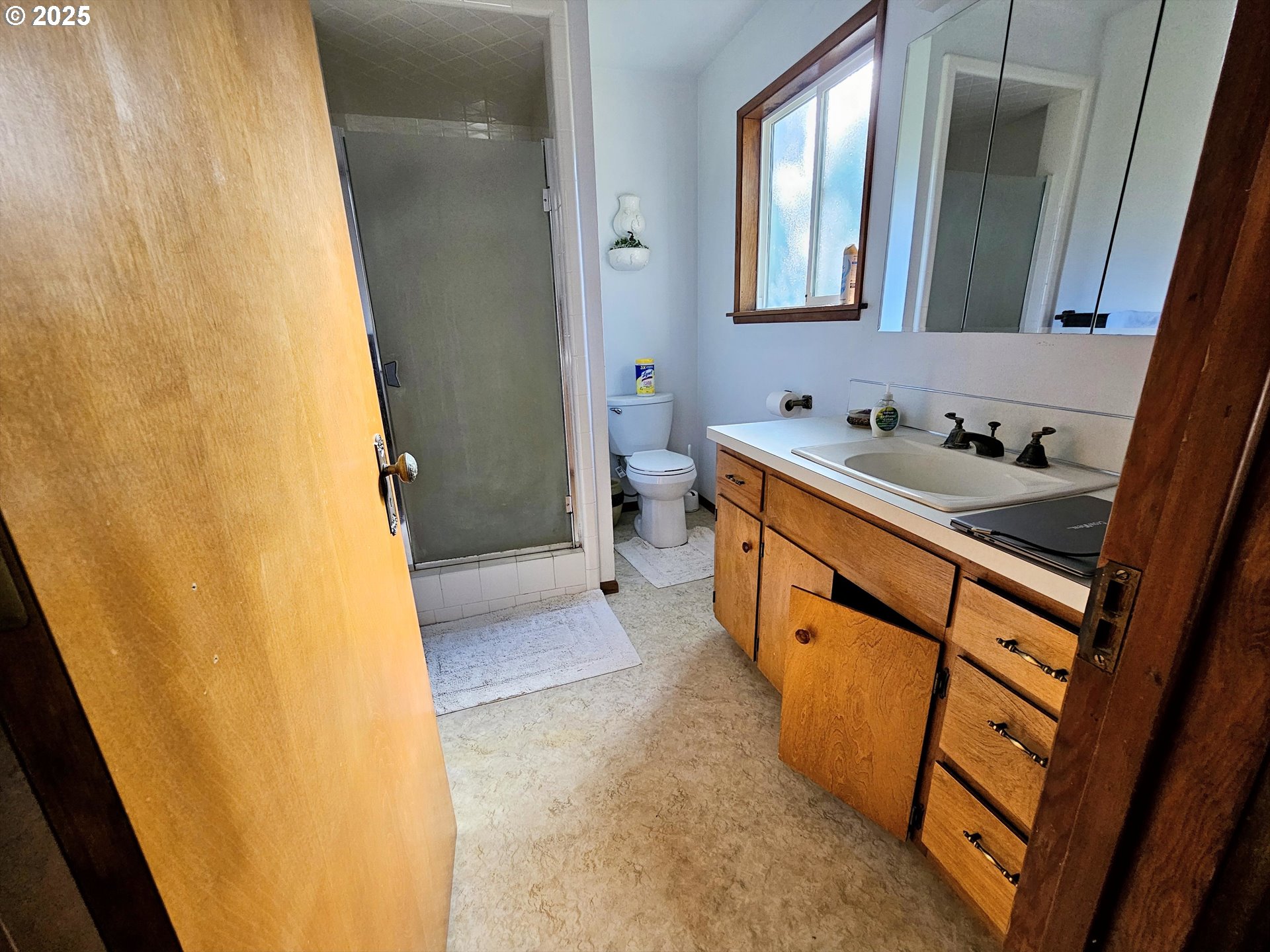 3463 Briarwood Road Umpqua, OR 97486 - Photo 7 of 29 a bathroom with a sink and a mirror