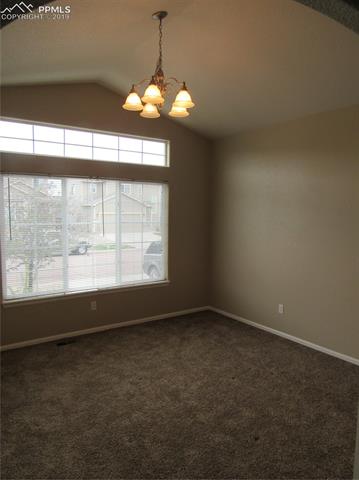 7334 Pearly Health Road Colorado Springs, CO 80908 - Photo 8 of 35 front Living room