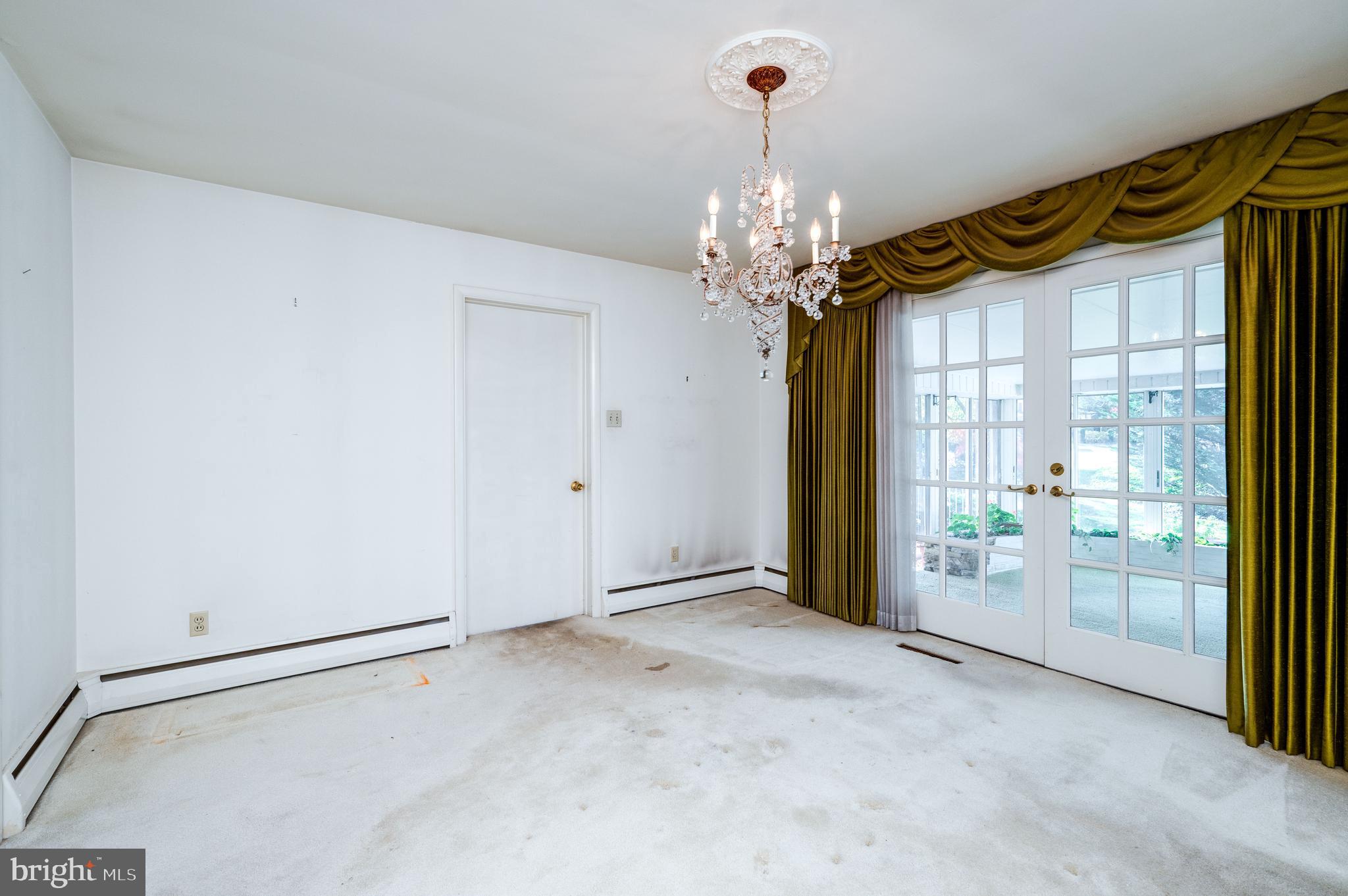 1202 Old Mill Road Wyomissing, PA 19610 - Photo 16 of 58 a view of a big room with windows