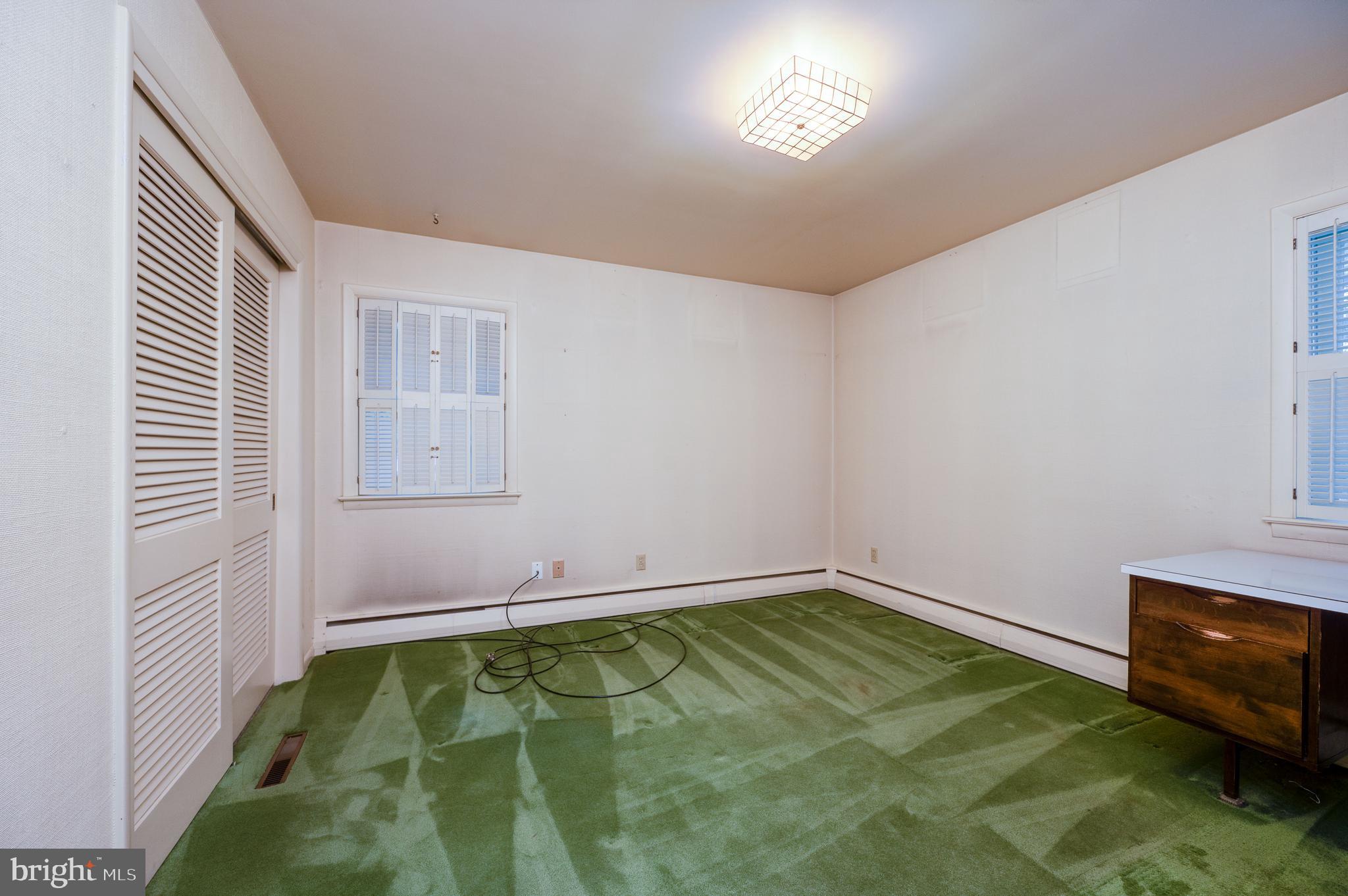 1202 Old Mill Road Wyomissing, PA 19610 - Photo 26 of 58 a room with a bed and a tv