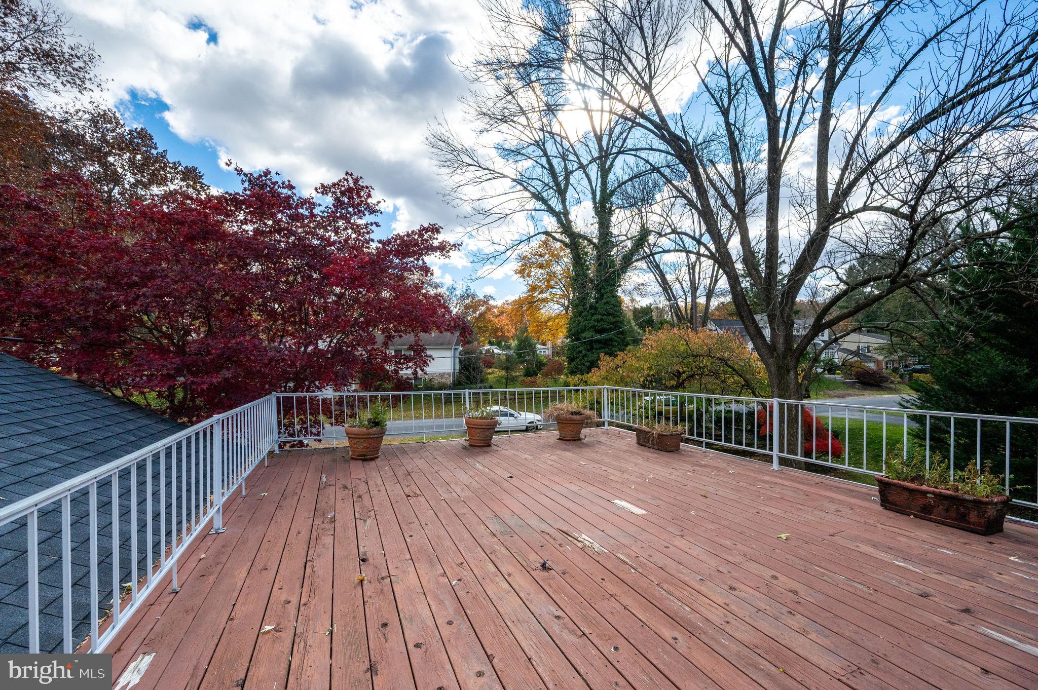1202 Old Mill Road Wyomissing, PA 19610 - Photo 31 of 58 a view of house with deck and outdoor space