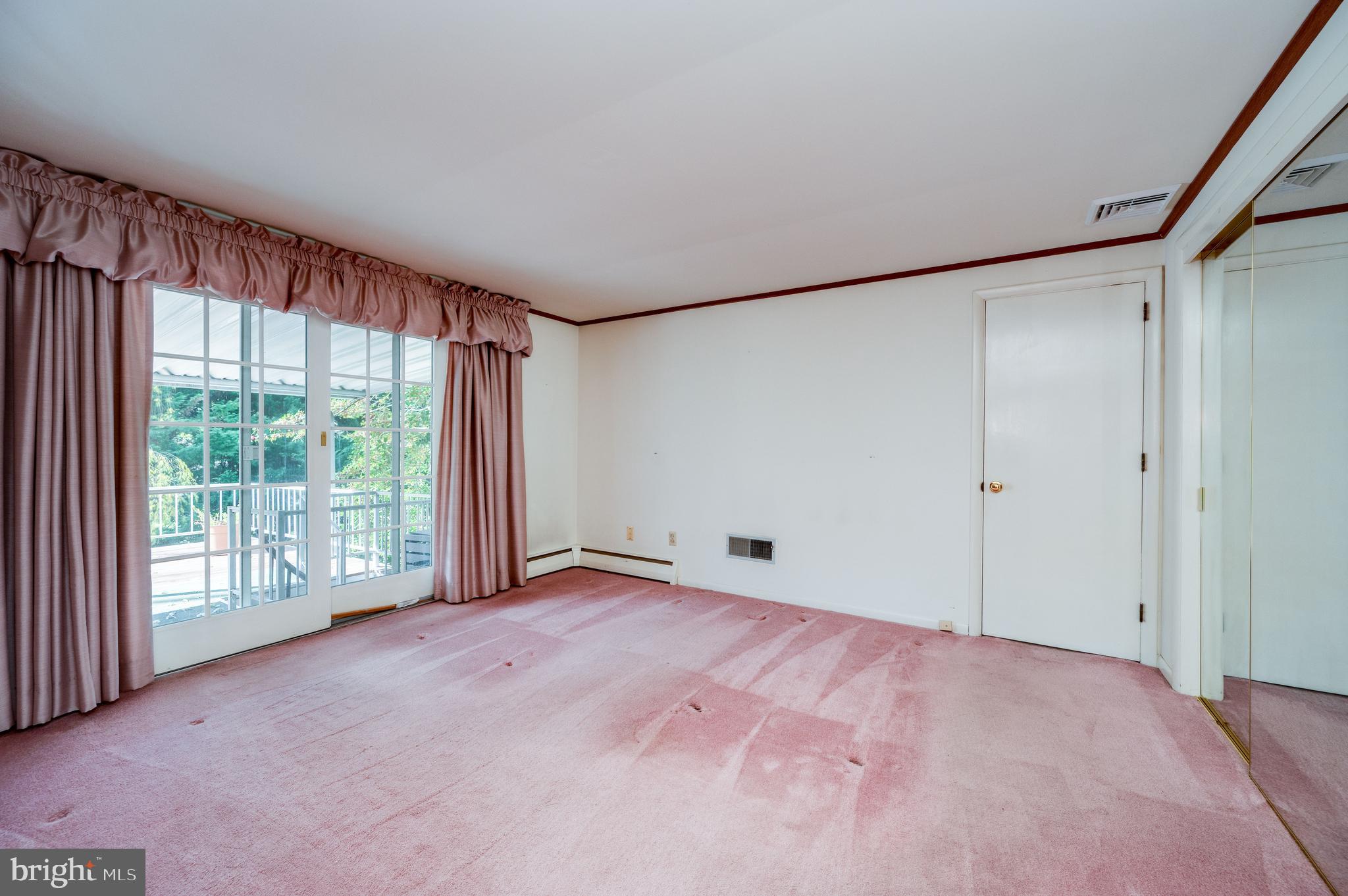 1202 Old Mill Road Wyomissing, PA 19610 - Photo 32 of 58 a view of an empty room with a window