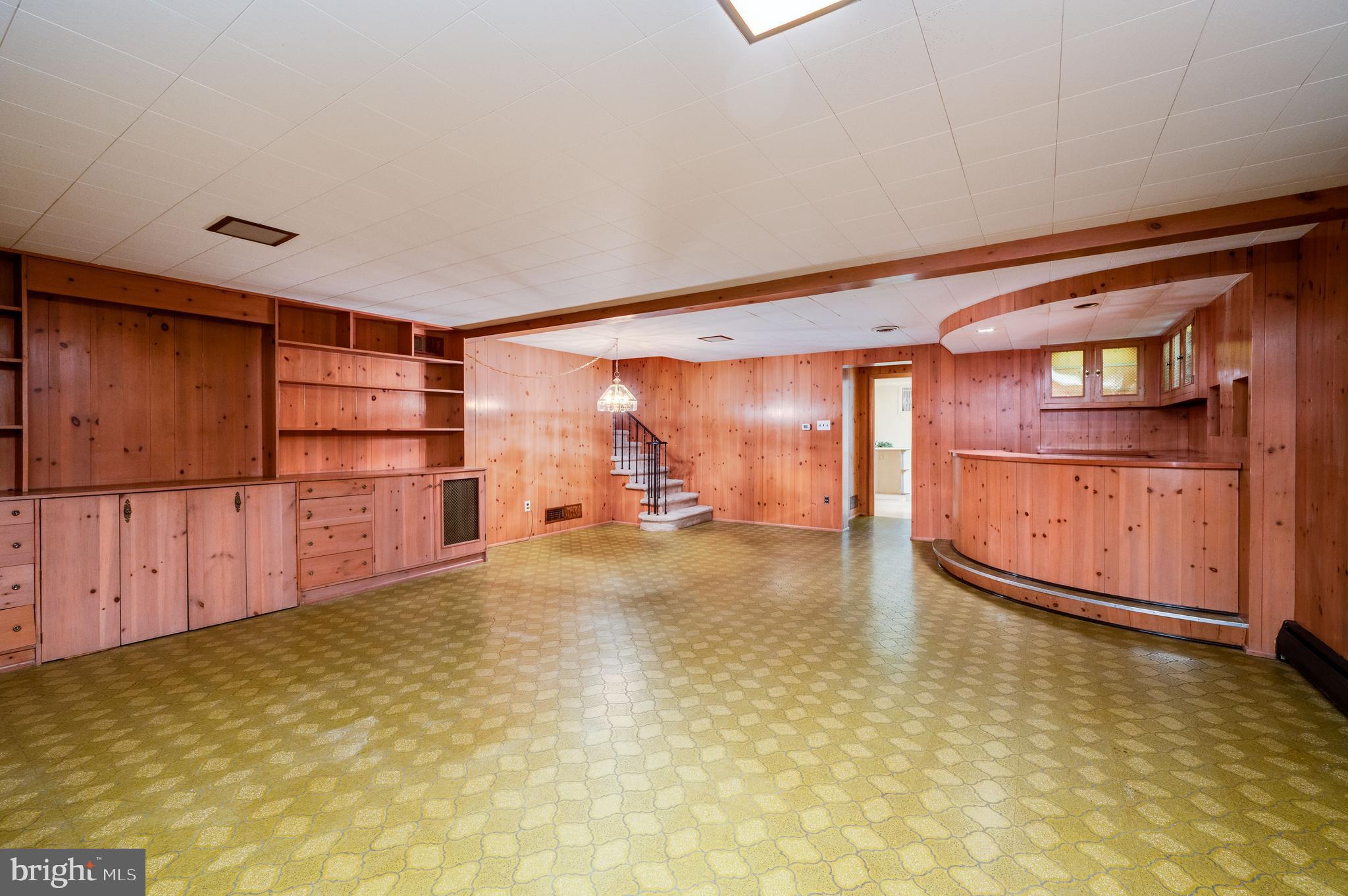 1202 Old Mill Road Wyomissing, PA 19610 - Photo 38 of 58 a view of a room with cabinet and mirrors