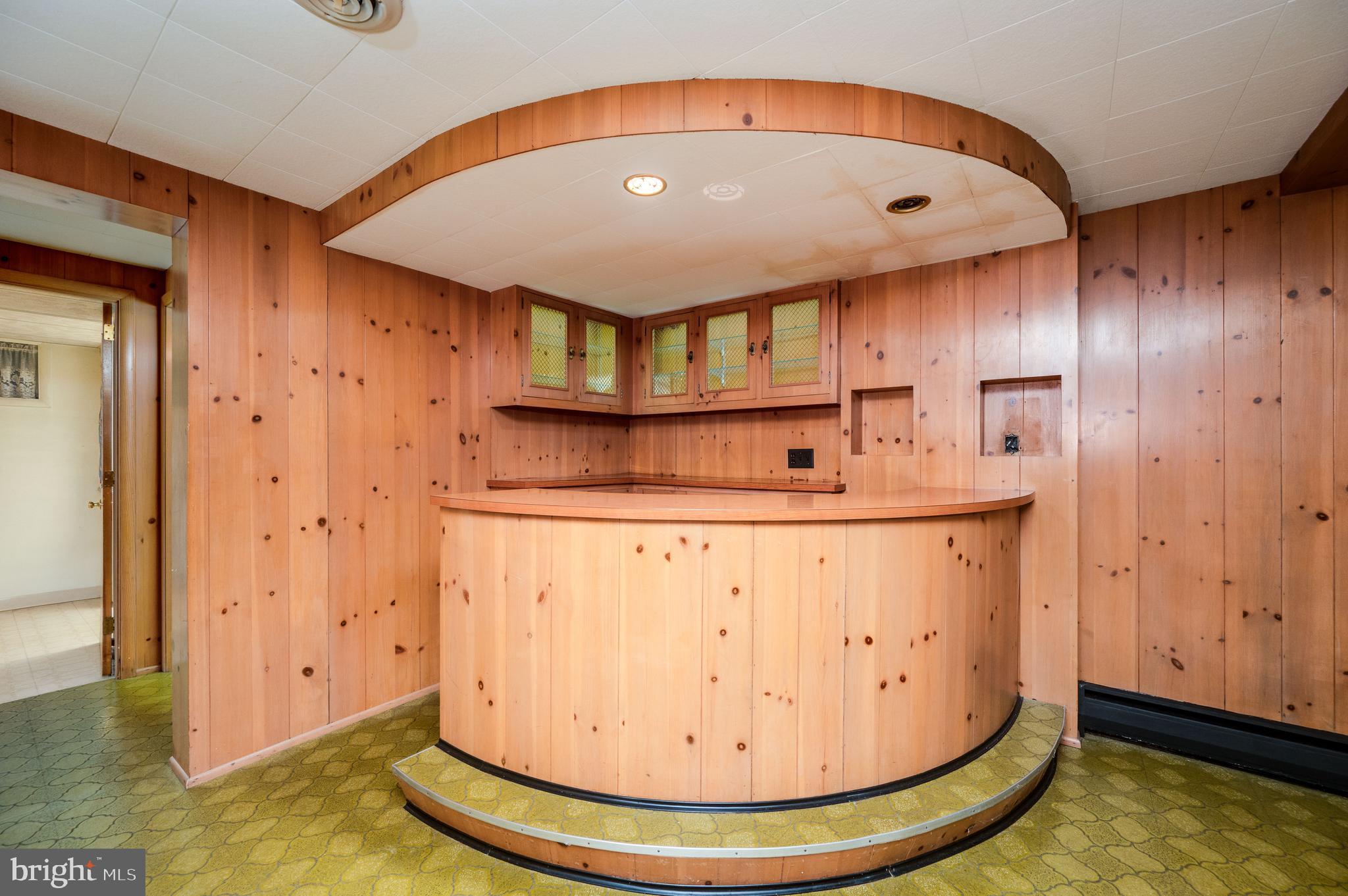 1202 Old Mill Road Wyomissing, PA 19610 - Photo 40 of 58 a view of a hallway with wooden cabinet