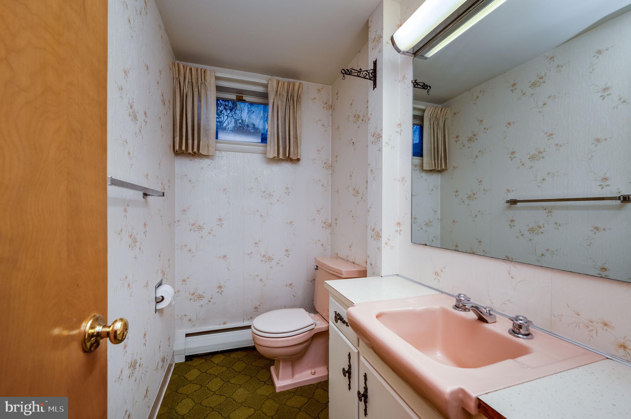 1202 Old Mill Road Wyomissing, PA 19610 - Photo 42 of 58 a bathroom with a sink toilet and shower