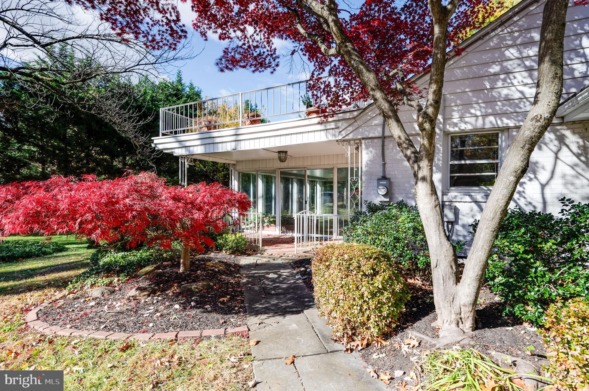 1202 Old Mill Road Wyomissing, PA 19610 - Photo 48 of 58 a view of a house with garden and plants