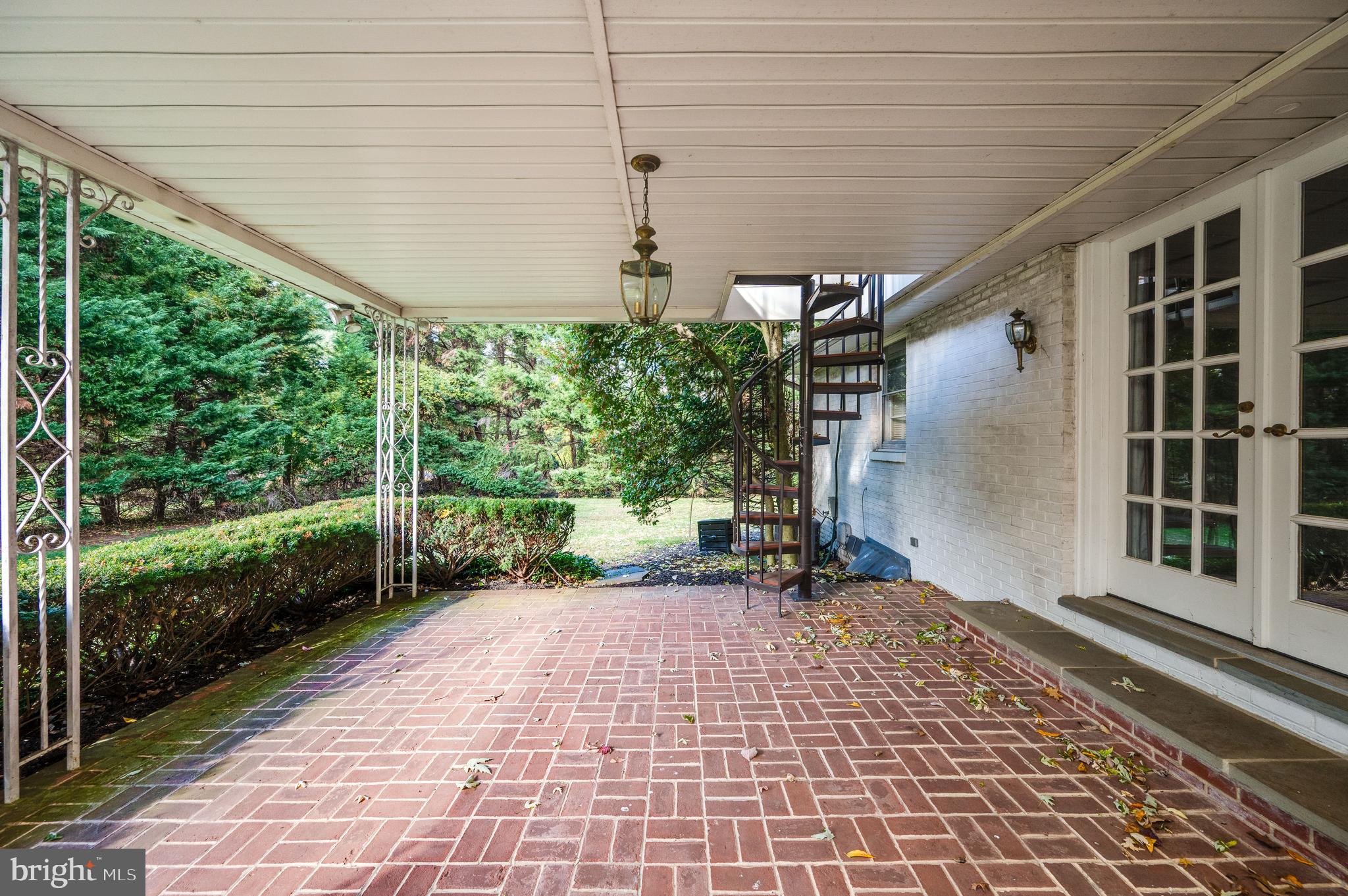 1202 Old Mill Road Wyomissing, PA 19610 - Photo 54 of 58 a view of a porch with a black gate