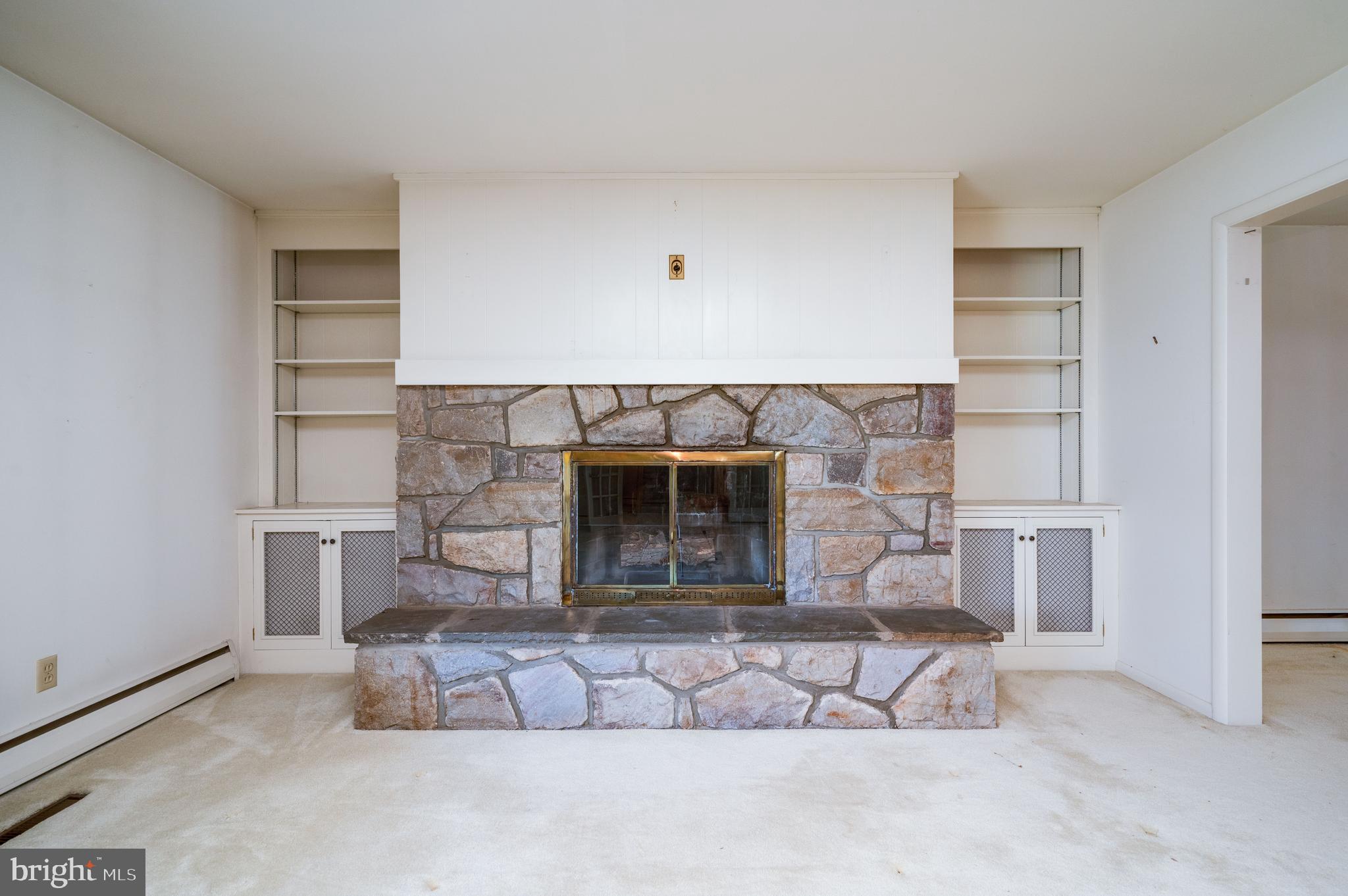 1202 Old Mill Road Wyomissing, PA 19610 - Photo 8 of 58 living room stone fireplace