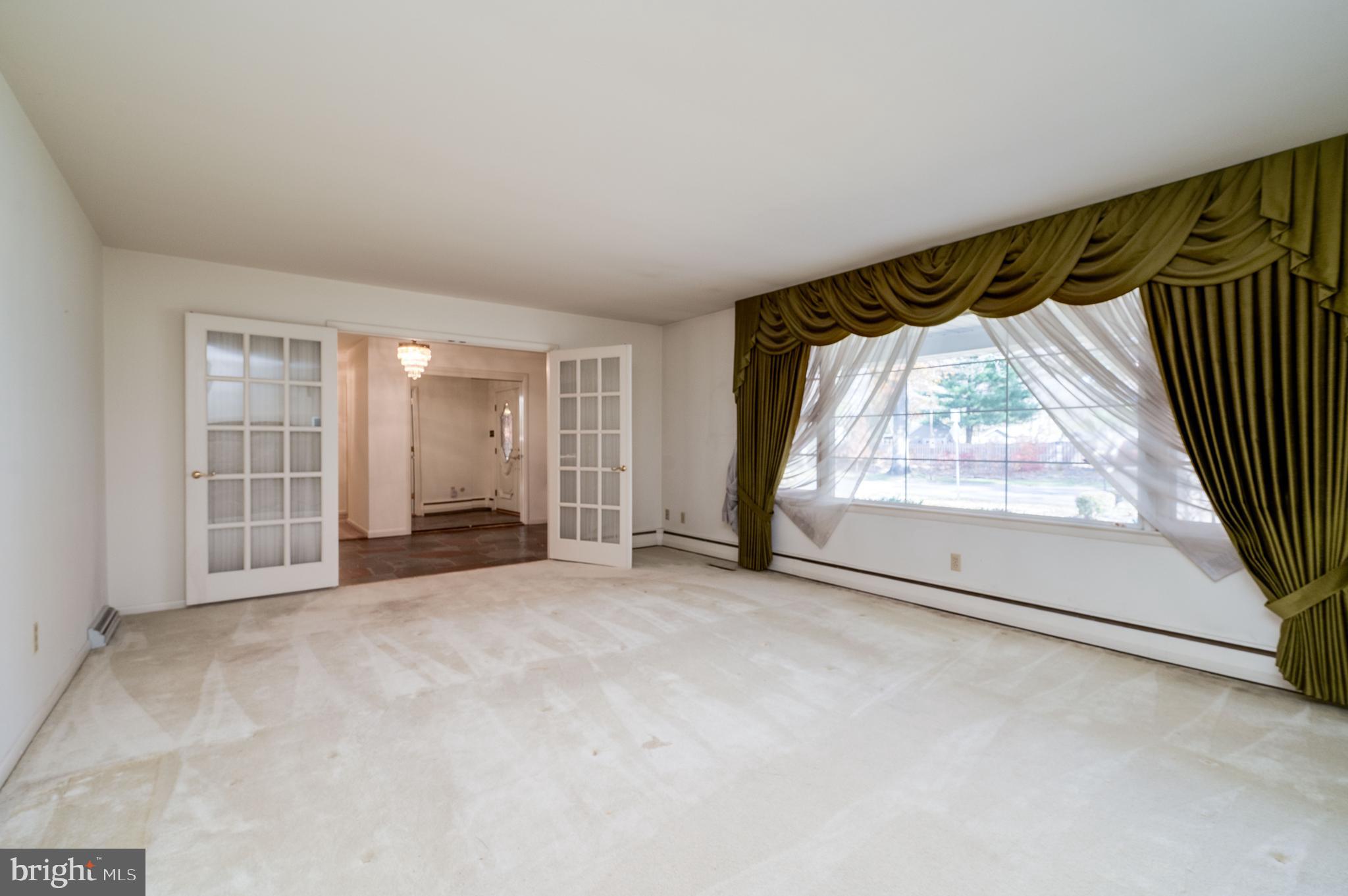 1202 Old Mill Road Wyomissing, PA 19610 - Photo 9 of 58 an empty room with windows