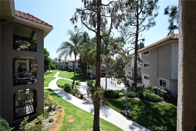 a view of a back yard of the house and a garden