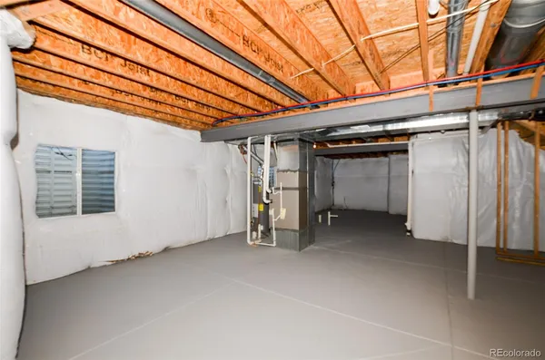 a view of a room with wooden walls