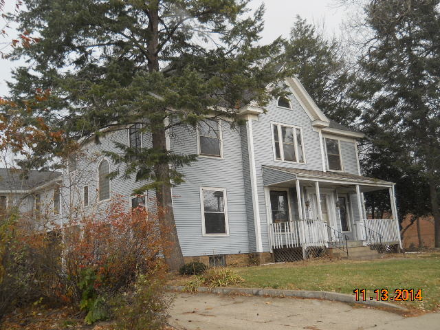 802 West 3rd Street Sterling, IL 61081 - Photo 1 of 21 a front view of a house with a garden