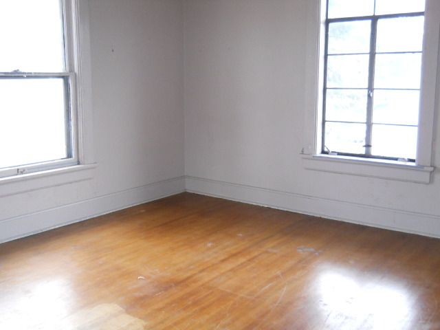 802 West 3rd Street Sterling, IL 61081 - Photo 12 of 21 an empty room with a window