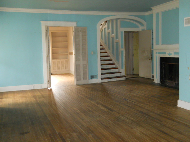 802 West 3rd Street Sterling, IL 61081 - Photo 19 of 21 wooden floor in an empty room with a window