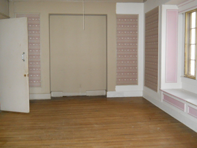 802 West 3rd Street Sterling, IL 61081 - Photo 20 of 21 a view of an empty room with a window