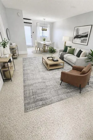 a living room with furniture and a couch