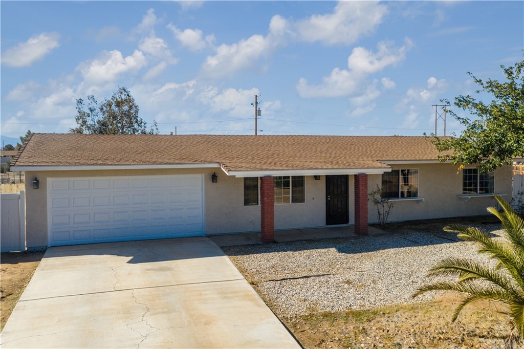 10840 Navajo Road Apple Valley, CA 92308 - Photo 1 of 1 a view of a house with a yard