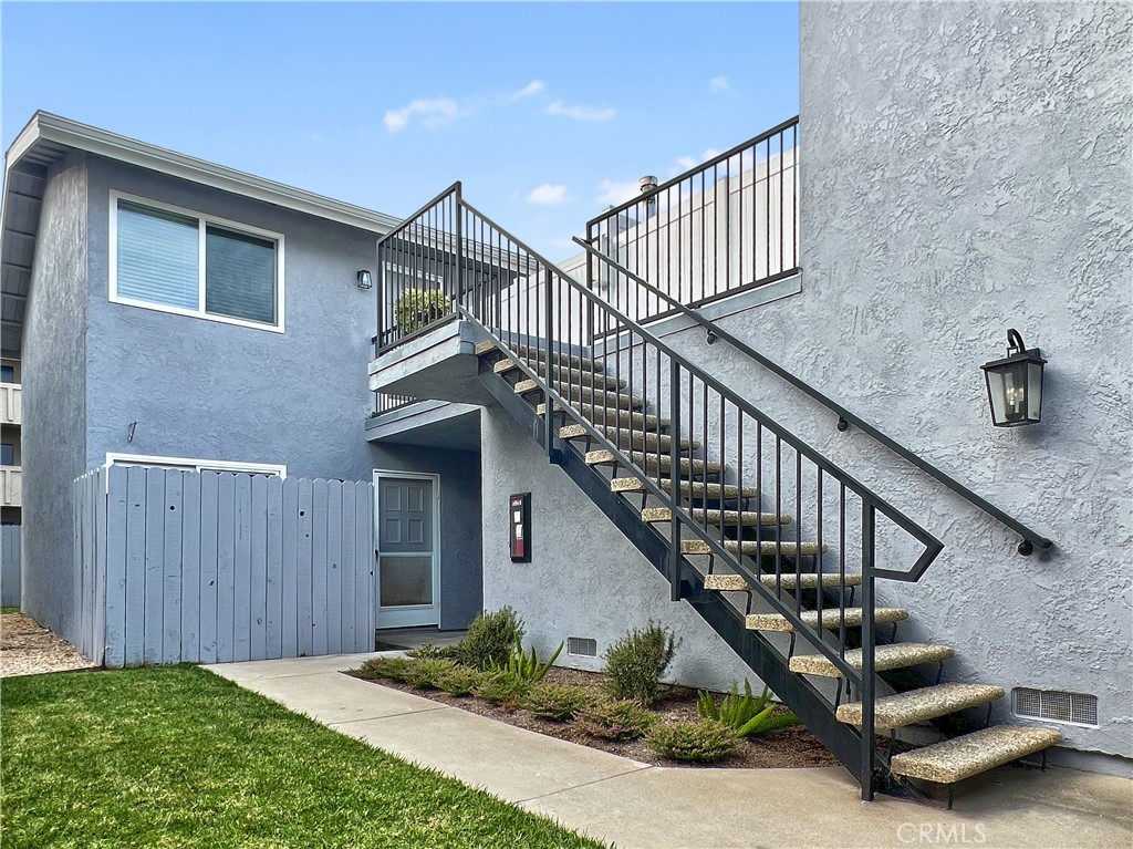 16941 Sims Lane, Unit B Huntington Beach, CA 92649 - Photo 11 of 12 Exterior of Apt B - downstairs with patio.