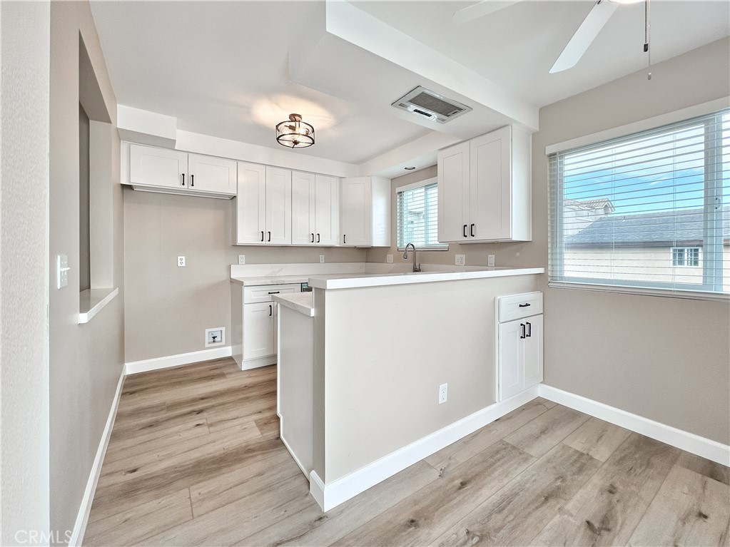 16941 Sims Lane, Unit B Huntington Beach, CA 92649 - Photo 5 of 12 Kitchen was fully remodeled in 2024. Stainless Steel refrigerator will be included with rental