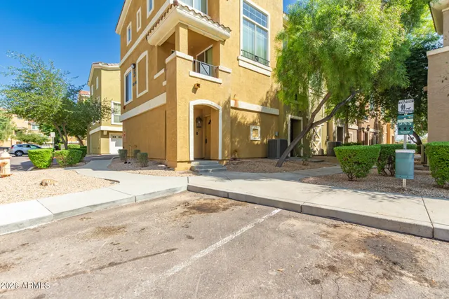 a view of a building with a street