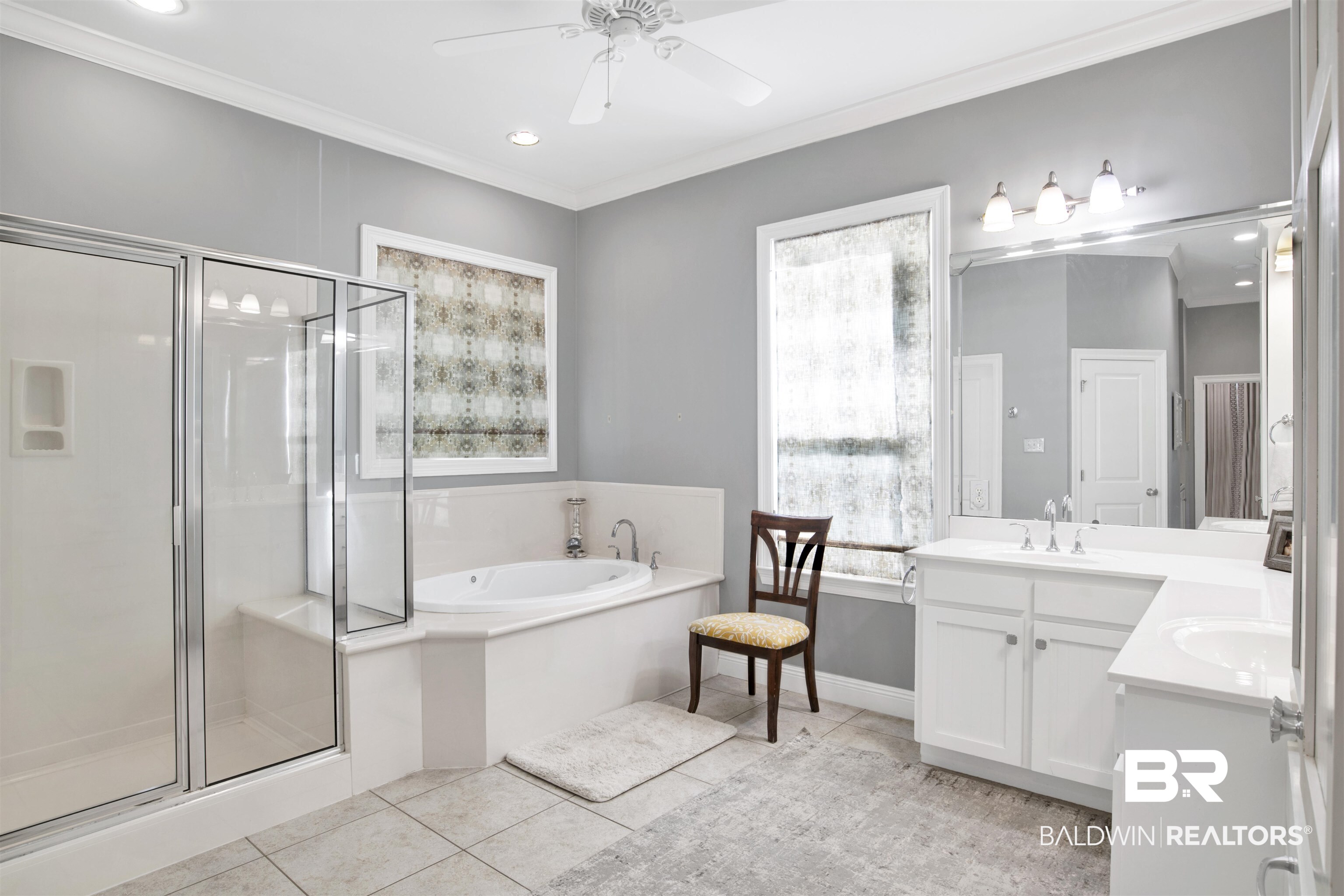11463 Getchell Drive Theodore, AL 36582 - Photo 14 of 39 Bathroom with plenty of natural light and separate shower and tub