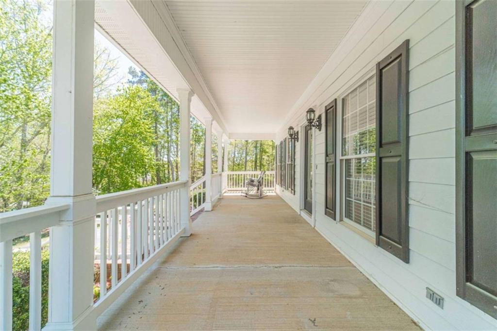 1925 Jesse Cronic Road Braselton, GA 30517 - Photo 3 of 58 a view of porch with wooden floor and fence