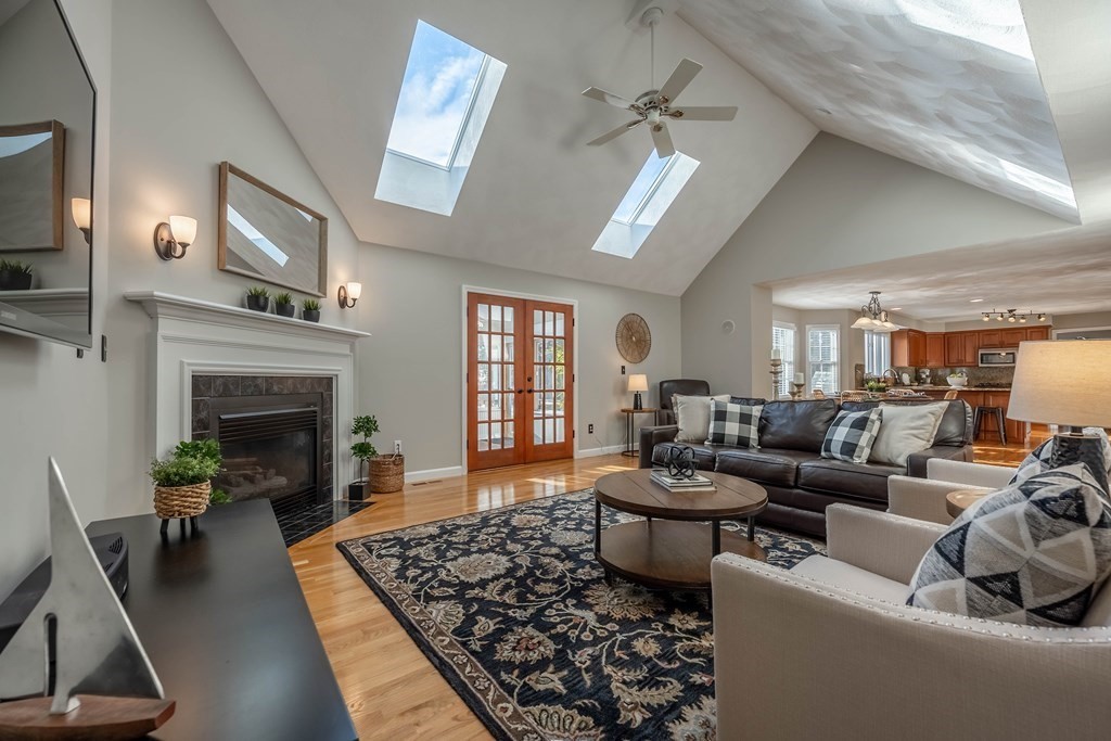5 Devonshire Place Andover, MA 01810 - Photo 11 of 42 a living room with furniture and a fireplace