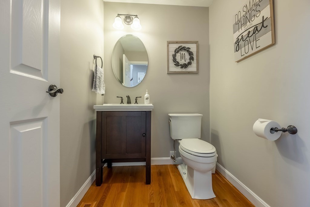 5 Devonshire Place Andover, MA 01810 - Photo 20 of 42 a bathroom with a toilet a sink and mirror