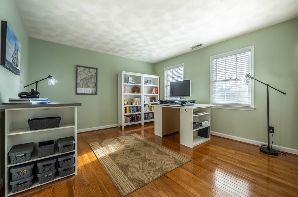 5 Devonshire Place Andover, MA 01810 - Photo 32 of 42 a room with furniture and a flat screen tv