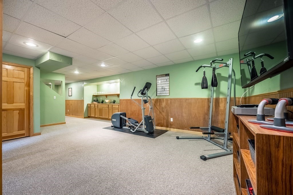 5 Devonshire Place Andover, MA 01810 - Photo 35 of 42 a room with gym equipment and a window