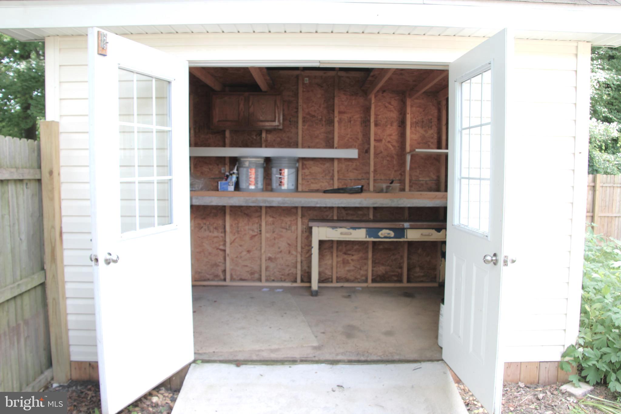 1122 Horsepond Road Dover, DE 19901 - Photo 26 of 26 a view of kitchen with furniture and window