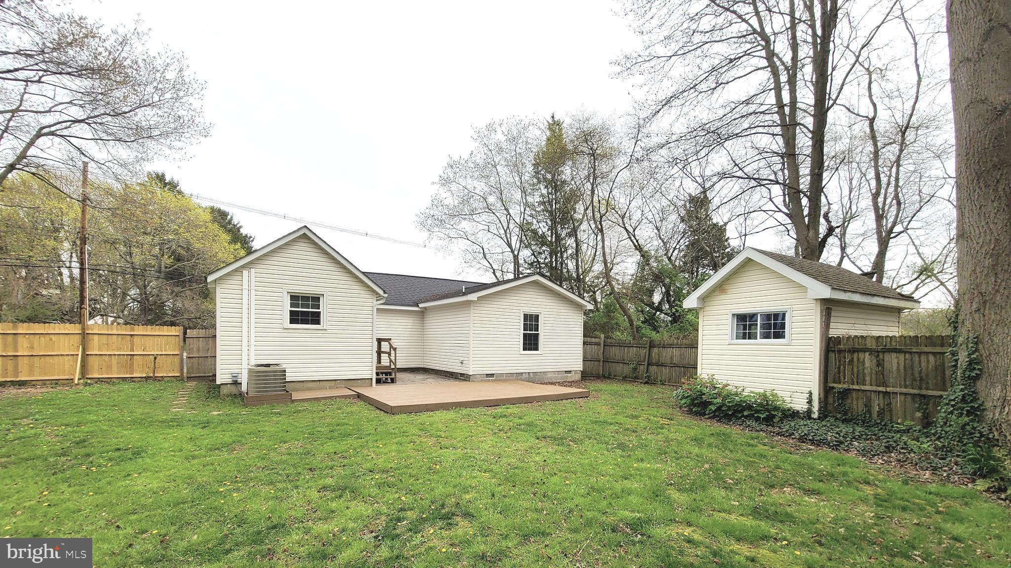 1122 Horsepond Road Dover, DE 19901 - Photo 5 of 26 a view of a house with a backyard