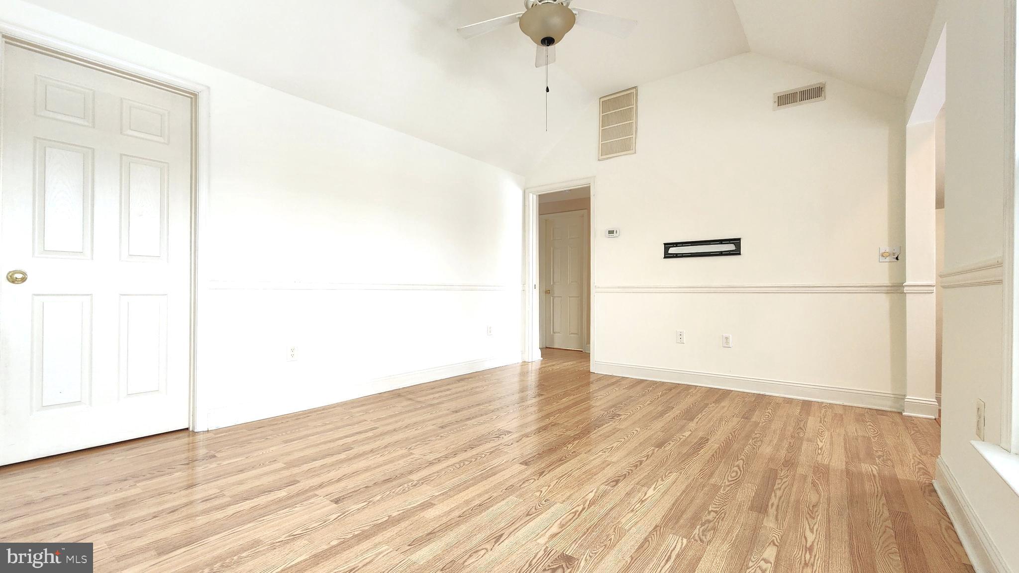 1122 Horsepond Road Dover, DE 19901 - Photo 8 of 26 a view of a room with wooden floor