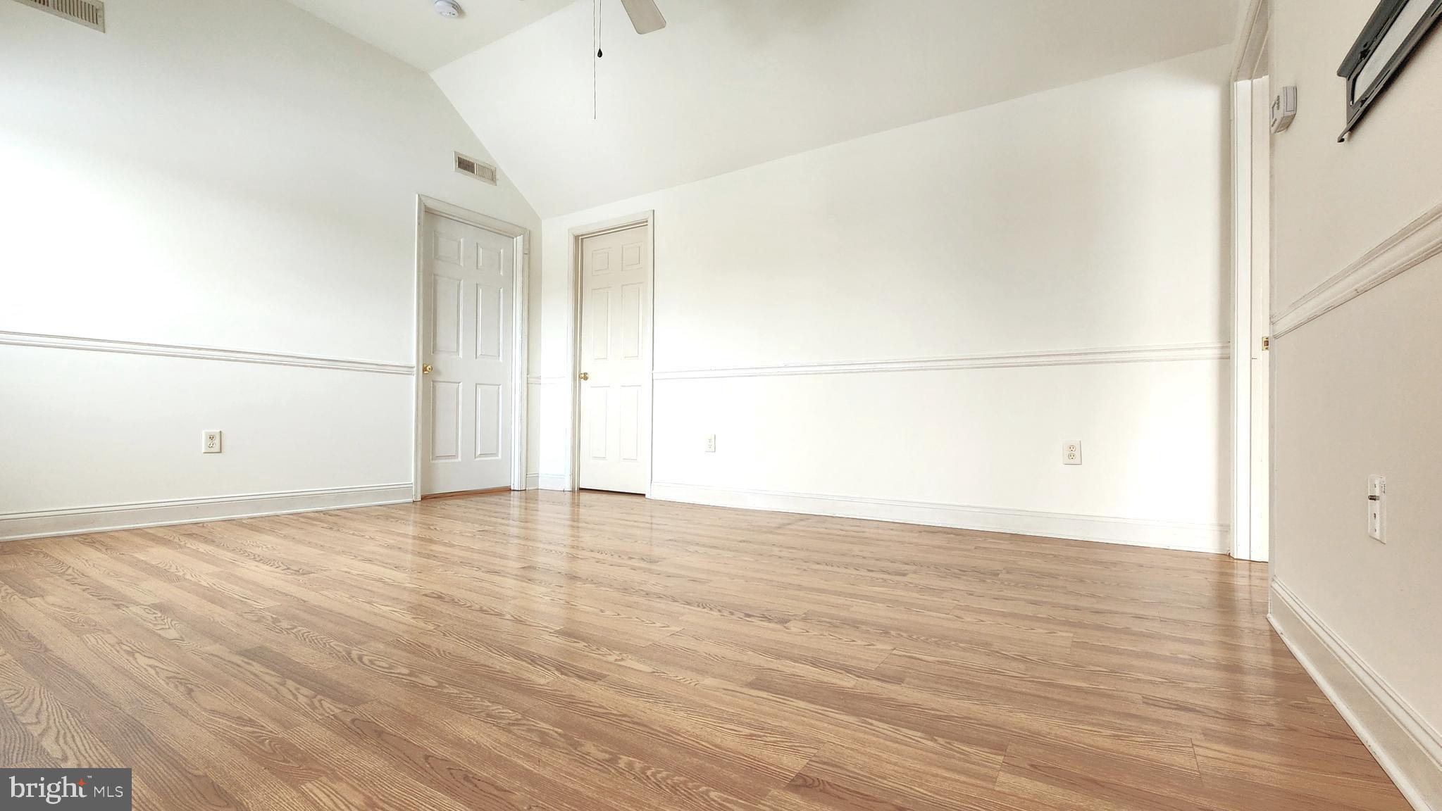 1122 Horsepond Road Dover, DE 19901 - Photo 9 of 26 a view of a room with wooden floor