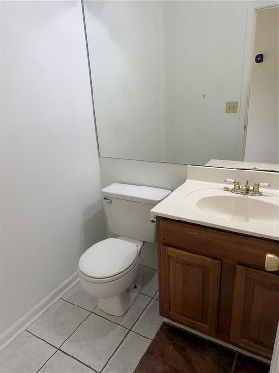 682 Bridge Way Lithonia, GA 30058 - Photo 11 of 25 a bathroom with a sink and a toilet