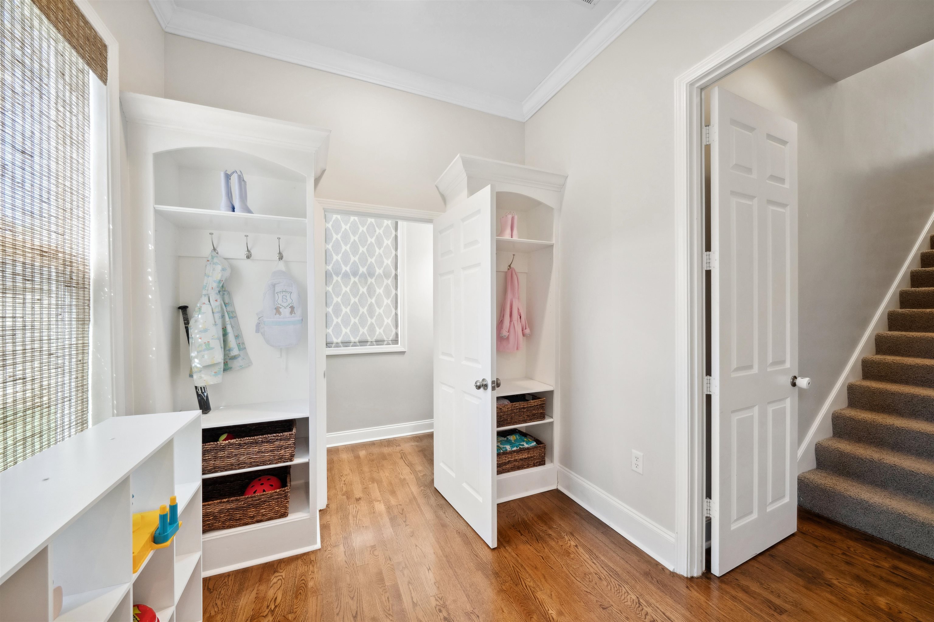 3794 Rosedale Drive Memphis, TN 38111 - Photo 15 of 33 Mudroom featuring wood finished floors, ornamental molding, and baseboards