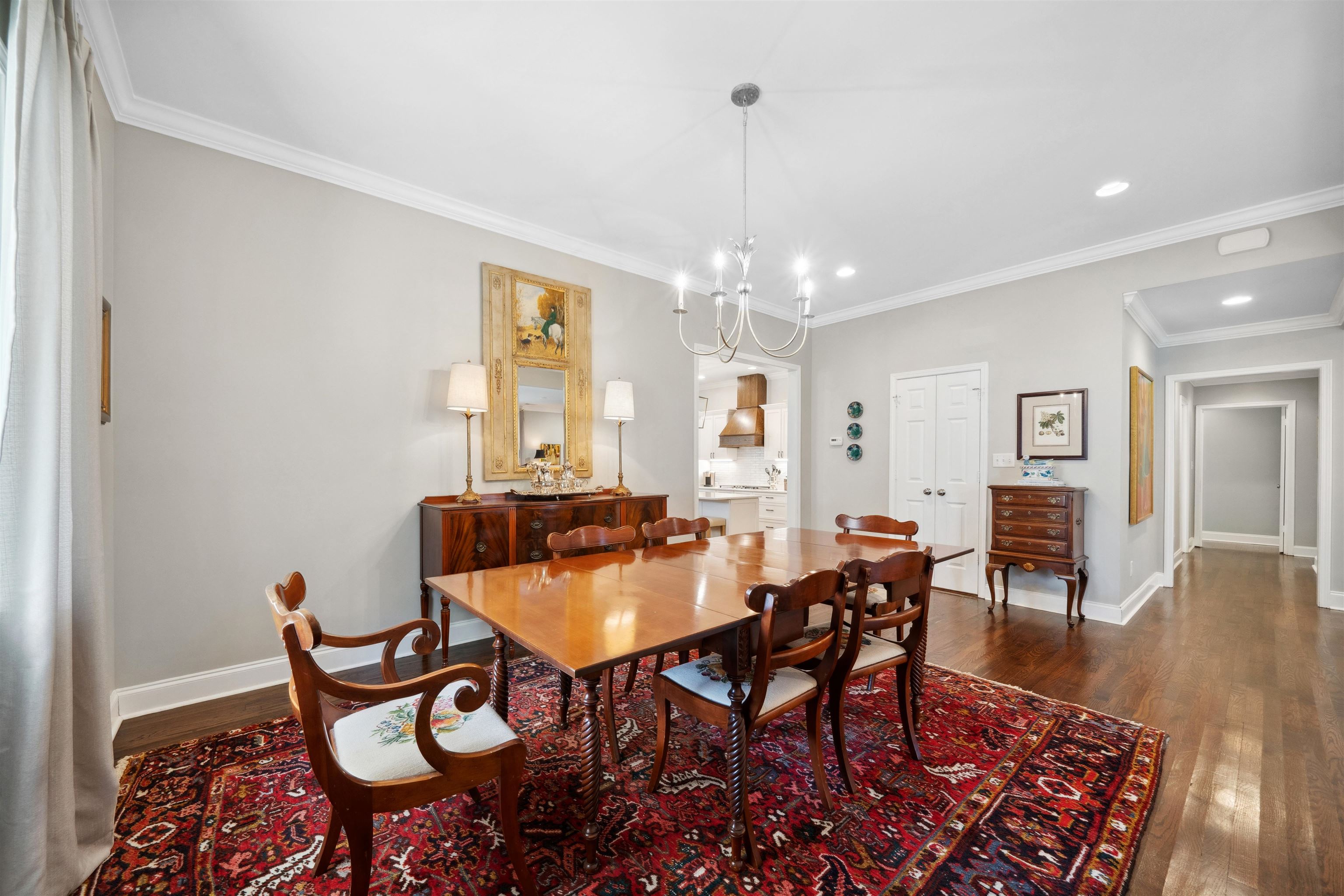 3794 Rosedale Drive Memphis, TN 38111 - Photo 8 of 33 Dining area with dark wood finished floors, crown molding, recessed lighting, a chandelier, and baseboards