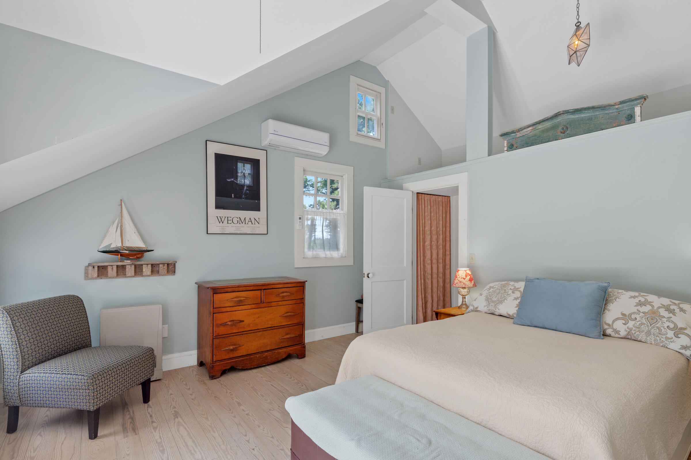 122 Gull Pond Road Wellfleet, MA 02667 - Photo 12 of 26 a bedroom with furniture and a couch