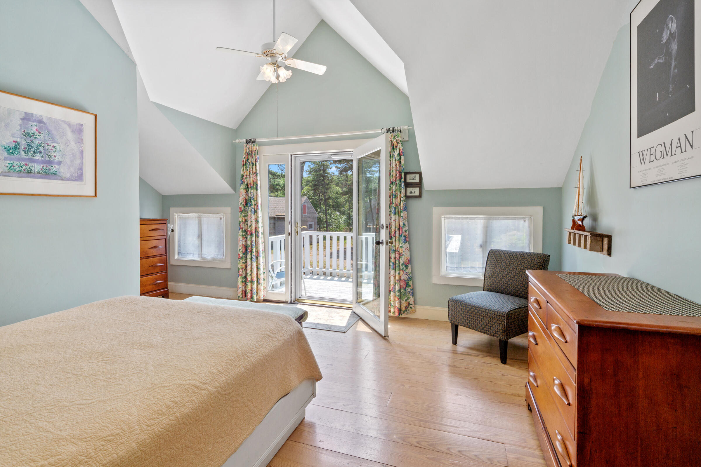 122 Gull Pond Road Wellfleet, MA 02667 - Photo 13 of 26 a bedroom with a bed and a desk