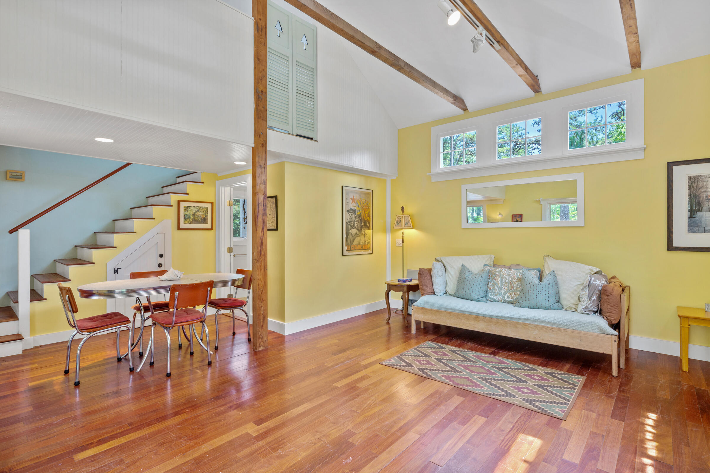 122 Gull Pond Road Wellfleet, MA 02667 - Photo 20 of 26 a living room with furniture and wooden floor