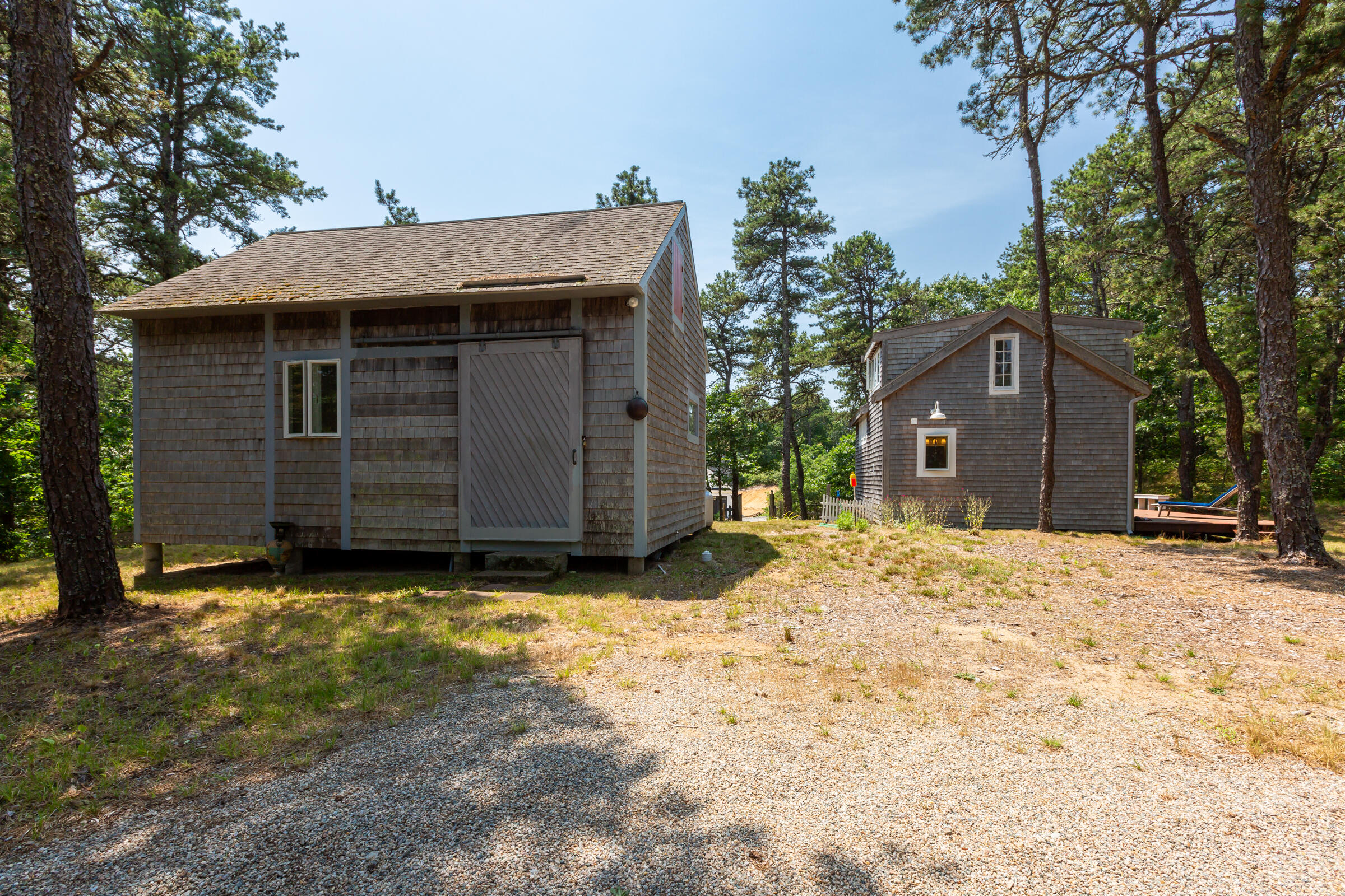 122 Gull Pond Road Wellfleet, MA 02667 - Photo 24 of 26 a view of a house with a yard