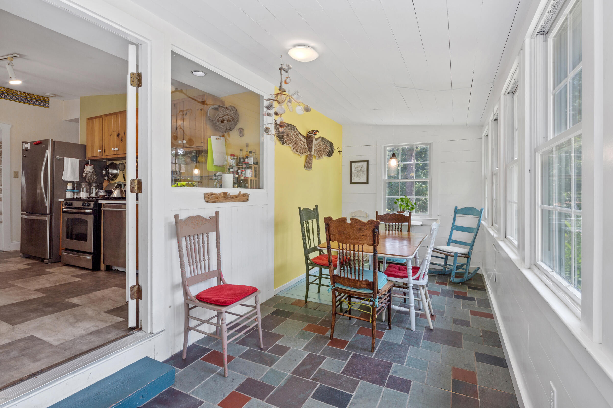 122 Gull Pond Road Wellfleet, MA 02667 - Photo 3 of 26 a view of a dining room with furniture