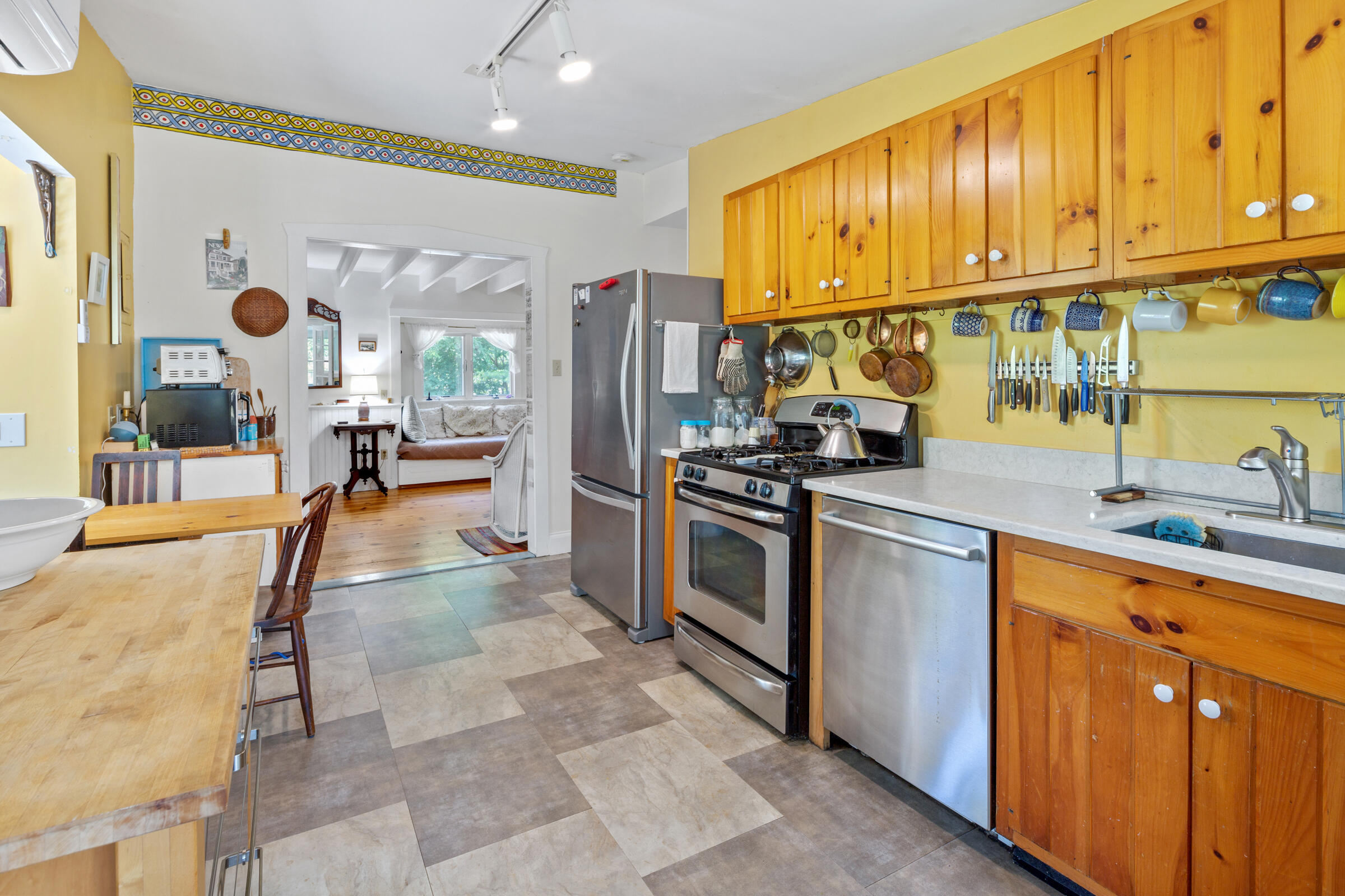 122 Gull Pond Road Wellfleet, MA 02667 - Photo 4 of 26 a kitchen with stainless steel appliances granite countertop a sink a stove and a refrigerator