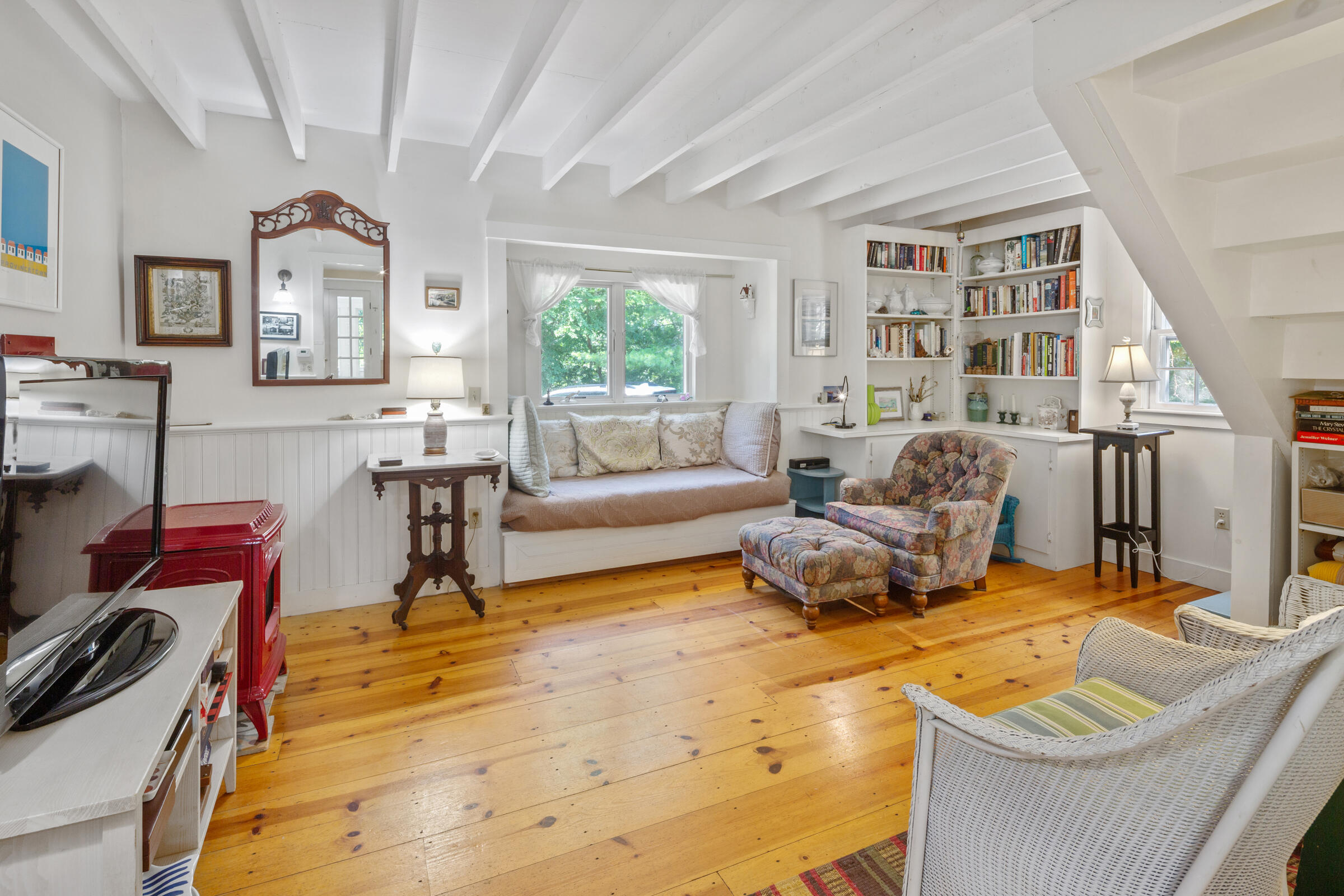 122 Gull Pond Road Wellfleet, MA 02667 - Photo 7 of 26 a living room with furniture and a large window