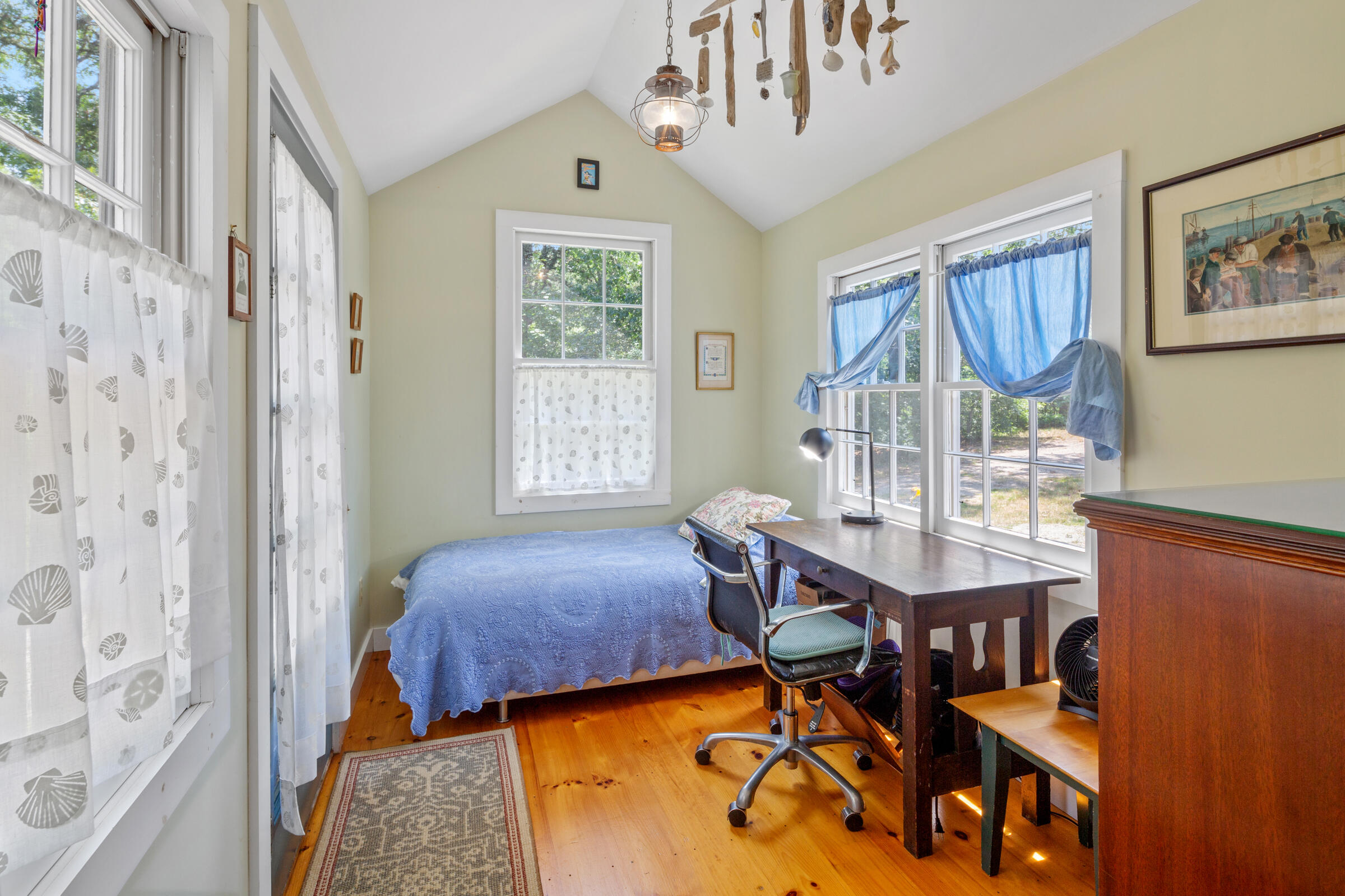 122 Gull Pond Road Wellfleet, MA 02667 - Photo 10 of 26 a view of a livingroom with furniture window and wooden floor