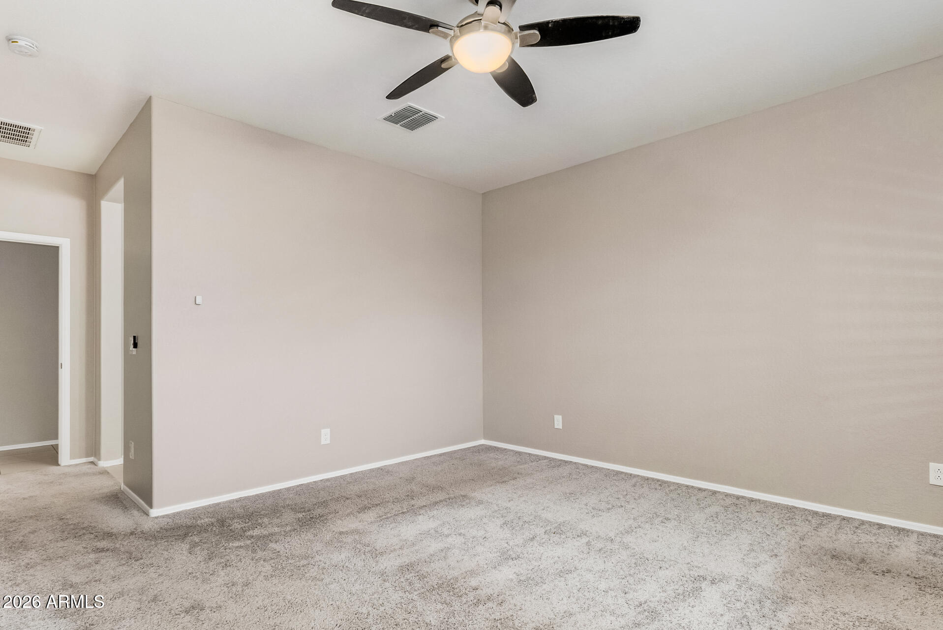 4228 West Coles Road Laveen, AZ 85339 - Photo 15 of 36 a view of an empty room