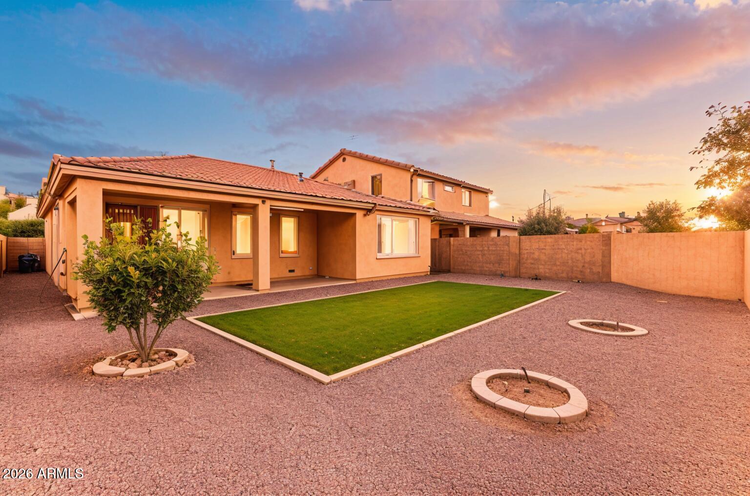 4228 West Coles Road Laveen, AZ 85339 - Photo 2 of 36 a front view of a house with yard