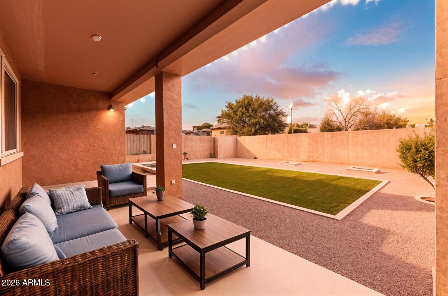 4228 West Coles Road Laveen, AZ 85339 - Photo 27 of 36 a view of a patio with chairs and a table