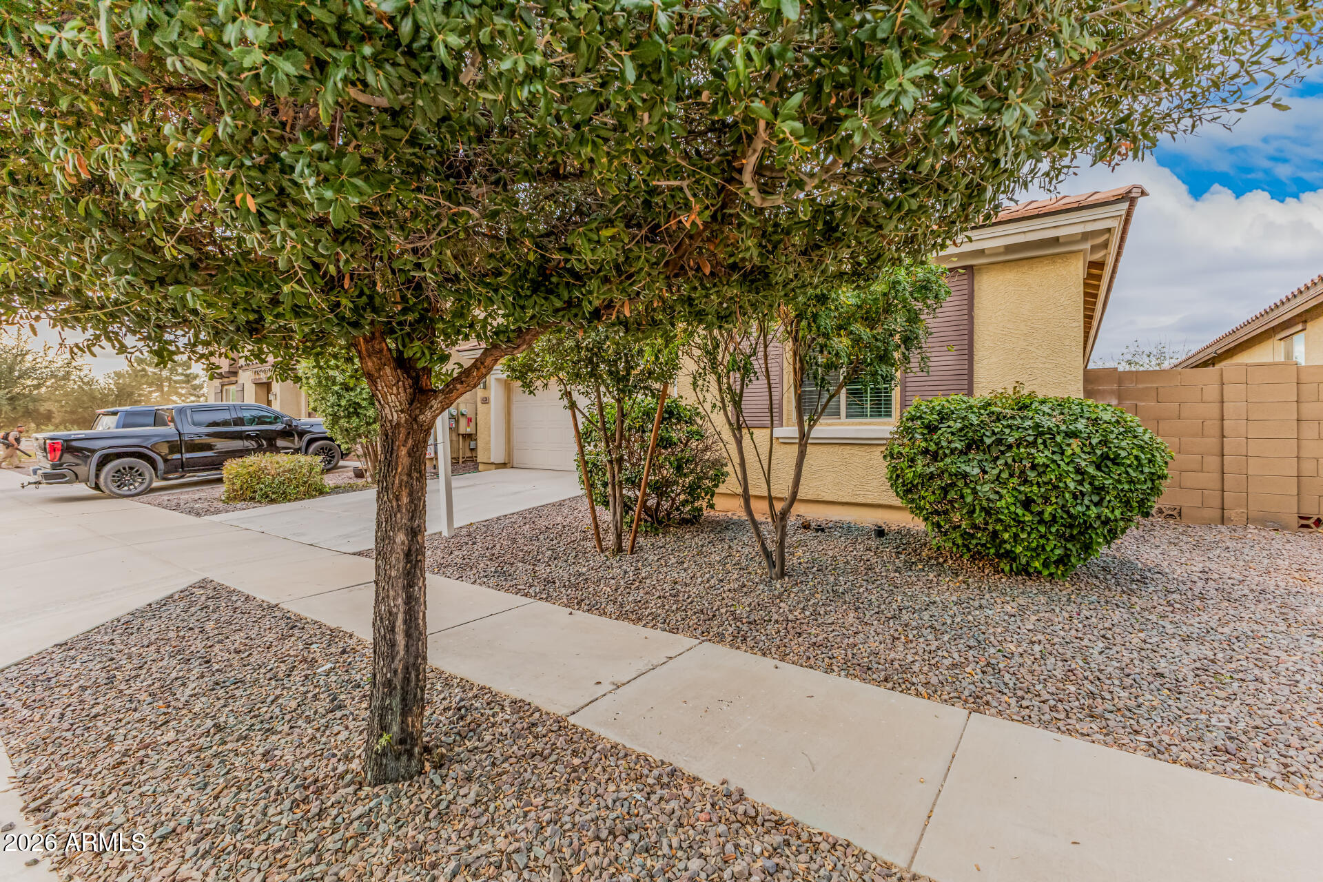 4228 West Coles Road Laveen, AZ 85339 - Photo 31 of 36 a street sign on the side of a road